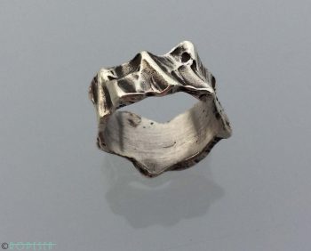 RopeSea Handmade sculpted breakwater rock silver jewelry ring - get the sea water movement and textures feeling. Unique nautical jewelry.